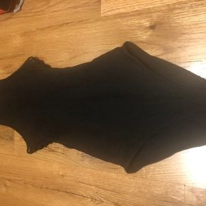 Black ribbed bodysuit with side slits